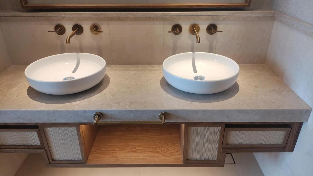 Finished washroom vanity with twin basins
