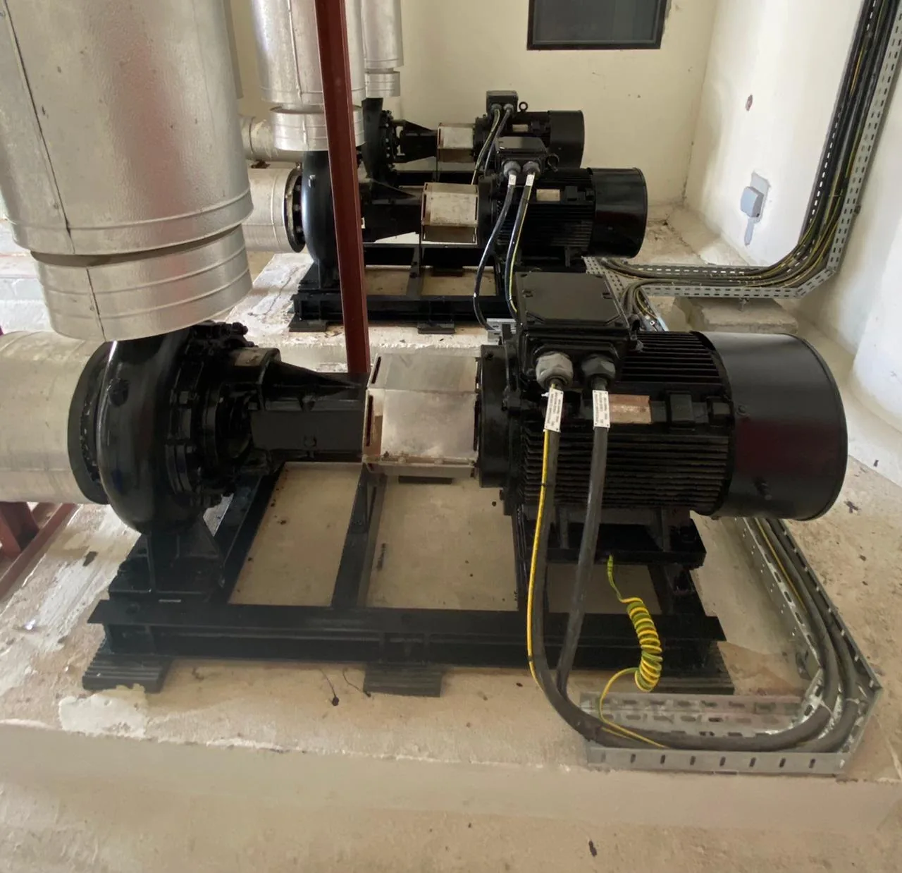 Pumps and motors mounted on steel bases